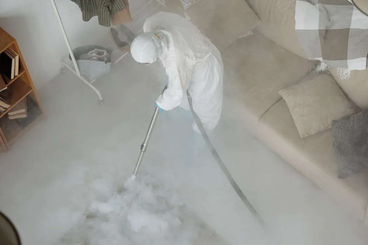 Biohazard cleanup technician in protective equipment, Mukilteo, WA